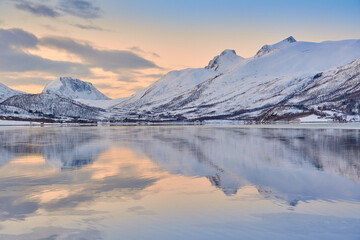 moody  coastal winter landscape in Stønnesbotn Fjord  on Senja Island in northern Norway