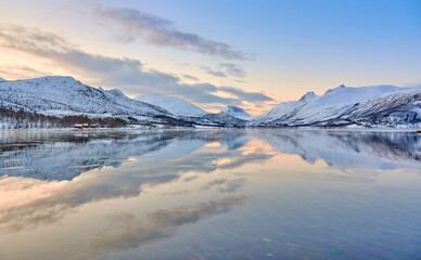 moody  coastal winter landscape in Stønnesbotn Fjord  on Senja Island in northern Norway
