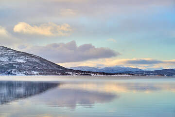 moody coastal winter landscape  near Gibostad  on Senja Island in northern Norway

