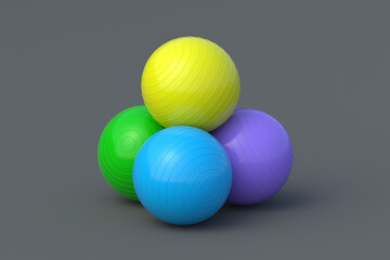 Heap of fitness balls on gray background. Pilates training. Sports equipment. Bodybuilding accessory. 3d render