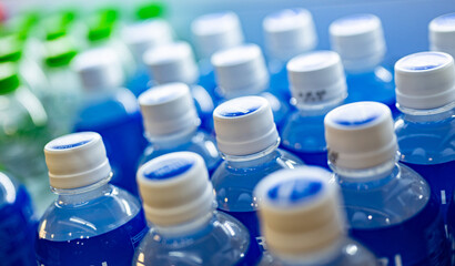 Bottles of mineral water in a commercial refrigerator