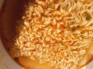 Hot instant noodles are a popular choice among Asians with limited money.