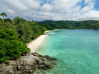 Drone view of beach with waves and clear sea water. Romblon Island. Romblon, Philippines.