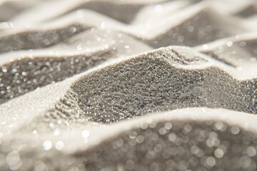 Macro shot of fine white sand dunes with sparkling grains. Close-up view of wind-formed ripples and shimmering quartz particles in sunlight. Natural texture and abstract background