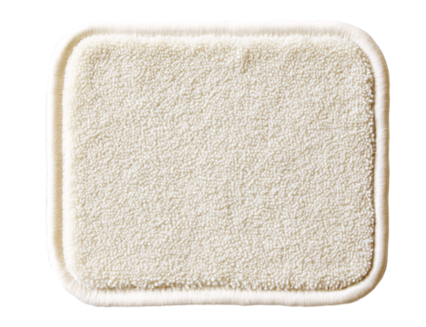 rectangular cloth patch with rounded corners, in a cream color, with a transparent background