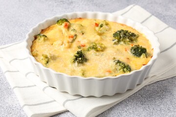 Delicious vegetable casserole on light table, closeup