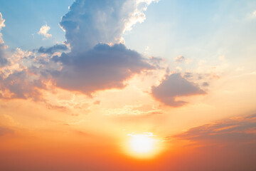 Sky,sunset, beautiful , luxury soft gradient orange gold clouds and sunlight on the blue sky perfect for the background, Sunrise on morning or evening in winter warm time ,Twilight summer,silhouette