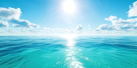 Obraz premium The ocean is blue and the sun is shining on it