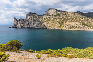 Fototapeta premium Views from the Golitsyn Trail - a mountain trail carved on the slope of Mount Koba-Kaya, located along the coastline southwest of the village of Novy Svet, Crimea, Russia