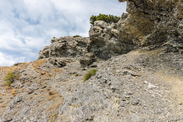 Rocks on the Golitsyn Trail is a mountain path cut into the slope of Mount Koba-Kaya, located along the coastline southwest of the village of Novy Svet, Crimea, Russia.