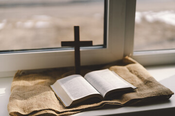 Reading the Holy Bible in home. Concept for faith, spirituality and religion. Peace, hope, dreams...