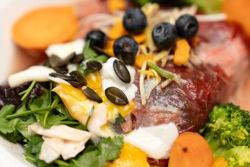 BARF diet for dogs or healthy ingredients for nutritious cooking, keto, paleo, and carnivore diet. Biologically appropriate raw food. Organic feeding for pets. High protein canine nutrition.