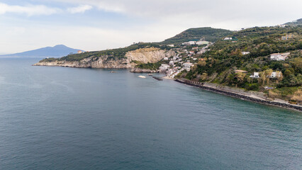Marina della Lobra, aerial photo of the small village of Massa Lubrense, the cliff of the Green Mile. Italy