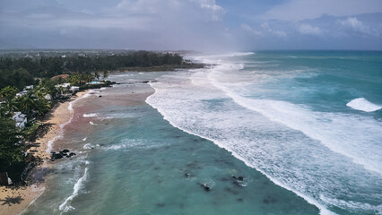 Aerial view of powerful high waves crashing in the Indian Ocean during a cyclone in Mauritius,...