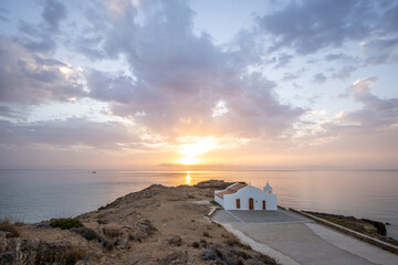 Agios Nikolaos a beautiful little white Greek church, catholic and triangular by the sea and St....