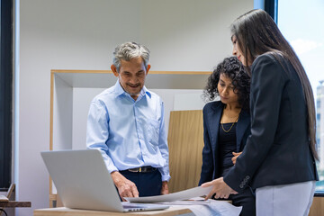 Team of architectures, engineer, interior designer and businessmen discussing and brainstorming on...