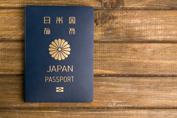 blue japan passport on wooden background