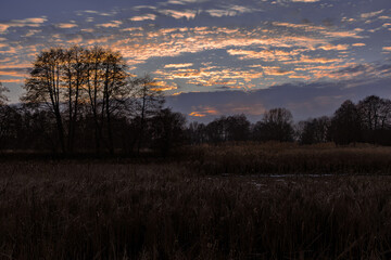 Winter sunset over the Raszyn ponds, Masovia, central Poland