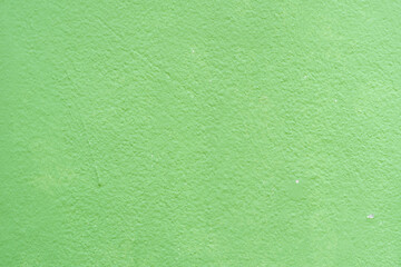 Abstract Background is made of green patterned concrete.