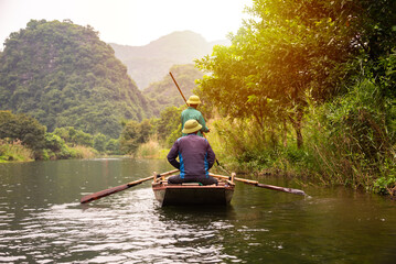 Boat on river in Ninh Binh, Vietnam. Beautiful asian landscape