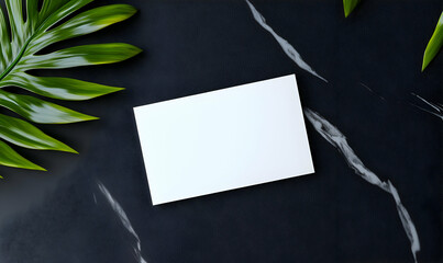White Blank Card on Dark Background with Green Leaves Surrounding It