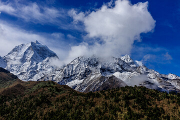 Nepal mountains landscape in Himalaya Everest Base camp trek. Beautiful landscape of snow summit eight thousand peaks above huge glacier and wide mountain valley Solo Khumbu, Sagarmatha Region