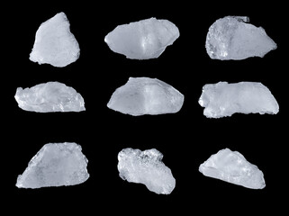Natural uneven pieces of ice isolated on a black background.