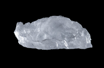 Natural uneven pieces of ice isolated on a black background.