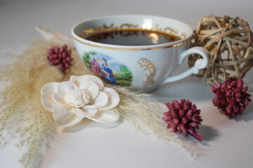 porcelain cup with black coffee