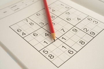 Sudoku puzzle, game to play for keep you brain younger for developing Alzheimer disease in senior patient.