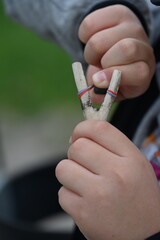 boy with a slingshot in the park,