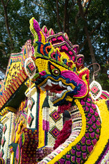 thailand dragon at chiang mai flower festival parade
