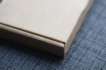 A close-up shot of a box sitting on a table, perfect for use in still life or product photography.