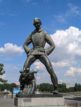 Antwerp, Belgium - May 31 2022: Statue of the trickster giant Lange Wapper by Het Steen fortress