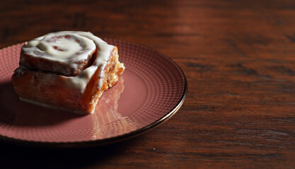 Sweet cinnamon roll dessert with icing.