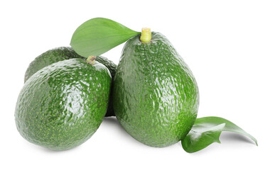 Whole ripe avocados with green leaves isolated on white