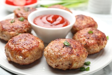 Delicious patties served on white table, closeup