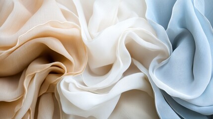 Fototapeta premium Three different colored pieces of fabric are folded together