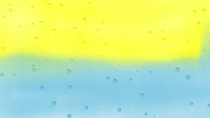 Vibrant Yellow and Blue Watercolor Background with Raindrops