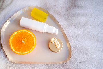 Vitamin C face serum with orange fruit