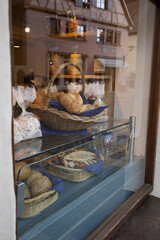 Cozy bakery window with fresh baked goods