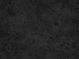 Faded dark concrete with uneven texture and visible discoloration.