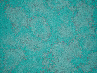 A textured turquoise cement background with subtle grey veining and marks.