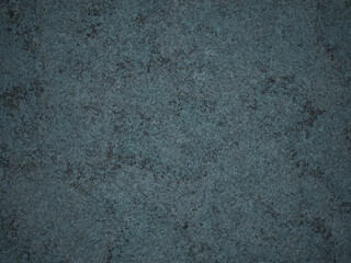 A weathered, dark cement background with uneven surface and slight grey streaks.