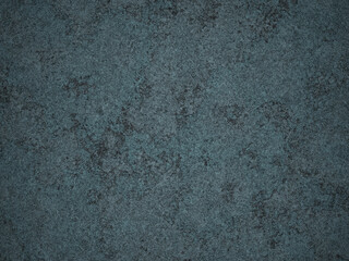 Close-up view of dark cement with a rough texture and subtle grey markings throughout.