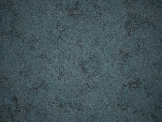 A distressed dark cement background with deep grey tones and uneven texture.