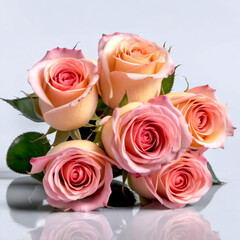 Fototapeta premium Beautiful fresh roses, close-up image, front view. Flowers bouquet lies on a glossy surface. Macro photo. Design element for gift or wedding card