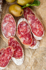 Fuet sausage Spanish meat delicacy fresh delicious gourmet food background on the table rustic food...