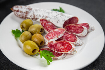 Fuet sausage Spanish meat delicacy fresh delicious gourmet food background on the table rustic food top view copy space