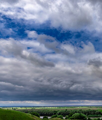 The sky is cloudy and the sun is not visible
